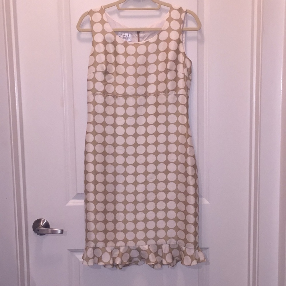 Elegant tan and white polka dotted David Warren.